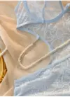 ثوب نوم أنيق للنساء مزين بالدانتيل الأزرق الفاتح والخرز اللامع والتصميم المفرغ